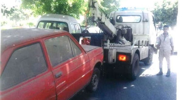 رفع 63 سيارة ودراجة بخارية متهاكلة من الطرق بالقاهرة